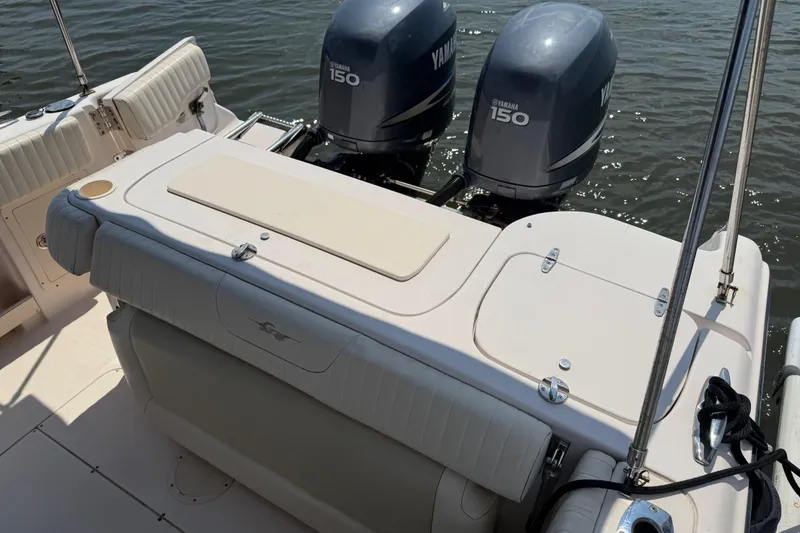 Slide: The Image of 2008 Grady-White Tournament 275 boat on trailer under a cloudy sky. - 9