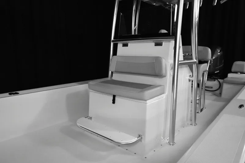 Slide: The Image of 2025 KenCraft 2460 Bay Rider Skiff interior seating and console. - 6