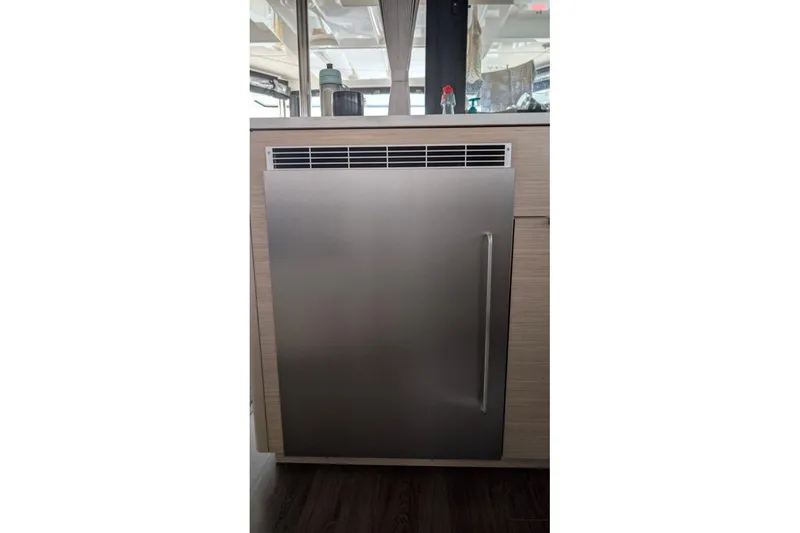 Slide: The Image of Stainless steel refrigerator on 2023 Lagoon 46 yacht interior. - 6