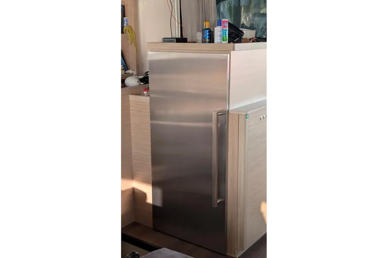 Slide: The Image of Stainless steel refrigerator in 2023 Lagoon 46 yacht interior. - 7