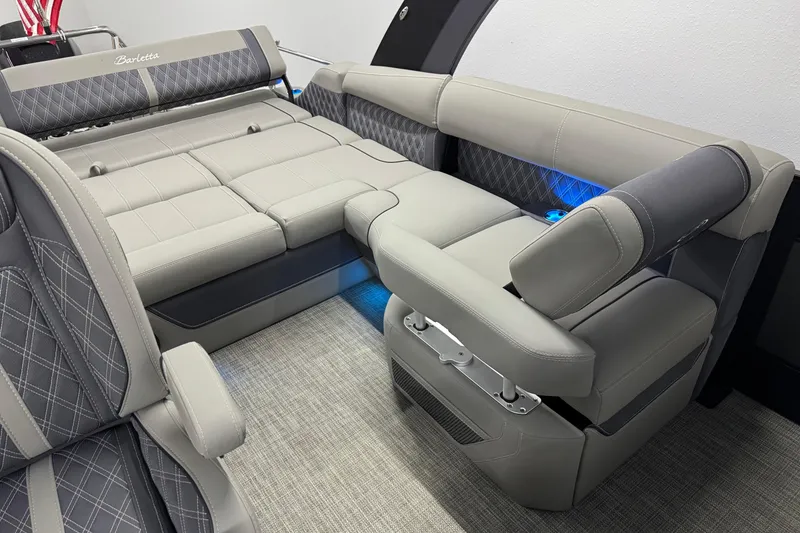Slide: The Image of Luxurious 2023 Barletta LUSSO 25U boat interior with plush seating and ambient lighting. - 20