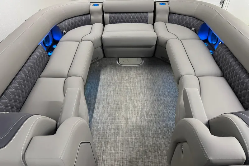 Slide: The Image of Luxurious interior of 2023 Barletta LUSSO 25U pontoon boat with plush seating and ambient lighting. - 29