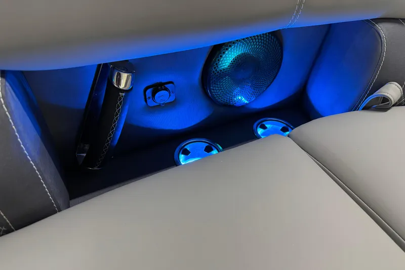 Slide: The Image of 2023 Barletta LUSSO 25U interior with blue LED lighting and speaker system. - 32