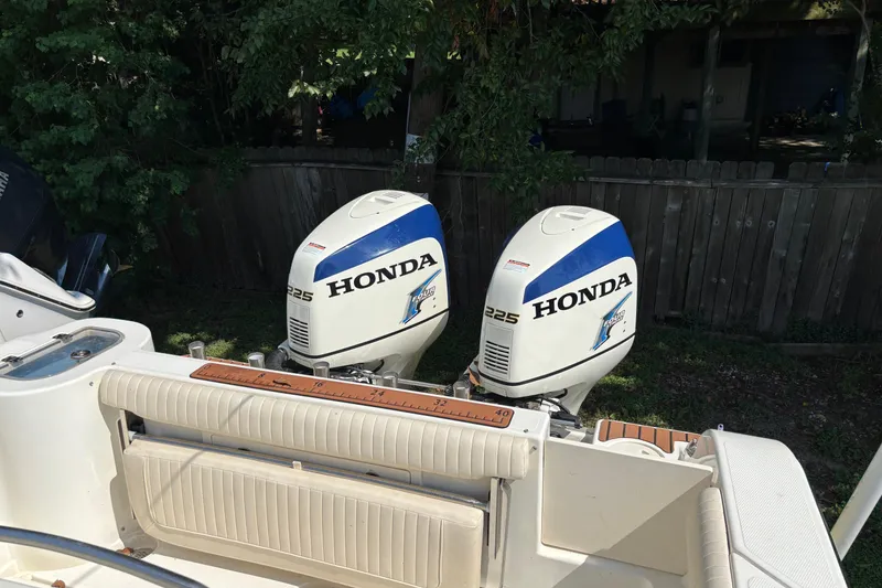 Slide: The Image of 2008 Mako 264 Center Console with twin Honda 225 outboard engines. - 3