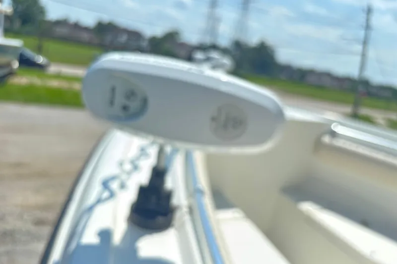 Slide: The Image of Blurry view of a 2008 Mako 264 Center Console boat detail. - 7