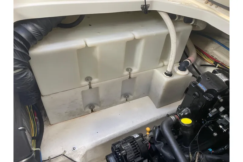 Slide: The Image of Engine compartment of a 2007 Bayliner 245 Ciera boat, showing components and wiring. - 8