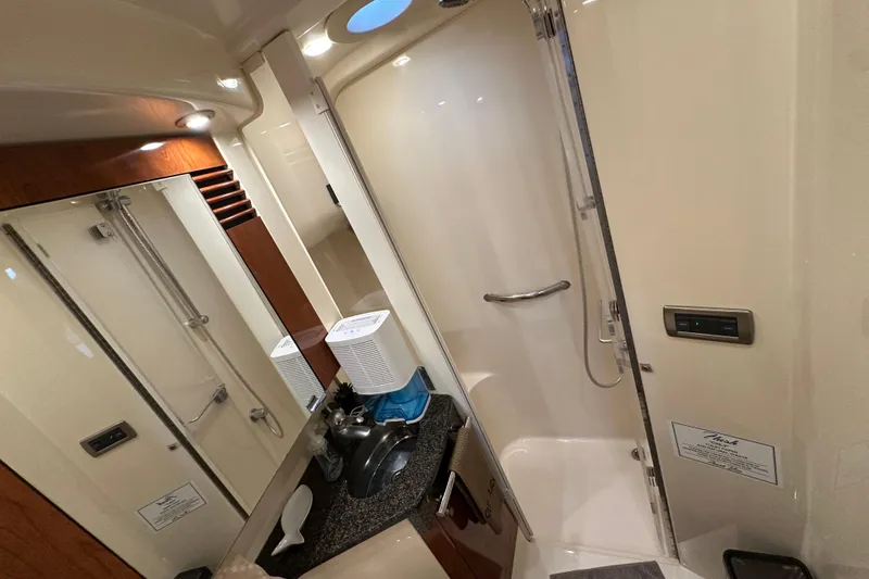 Slide: The Image of Luxurious bathroom interior of 2004 Sea Ray 420 Sedan Bridge yacht. - 24