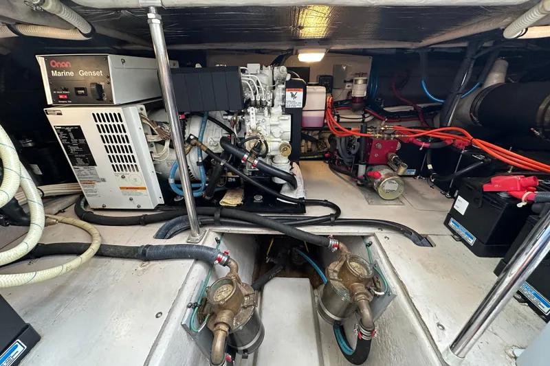 Slide: The Image of Engine room of 2004 Sea Ray 420 Sedan Bridge with Onan Marine Genset. - 31