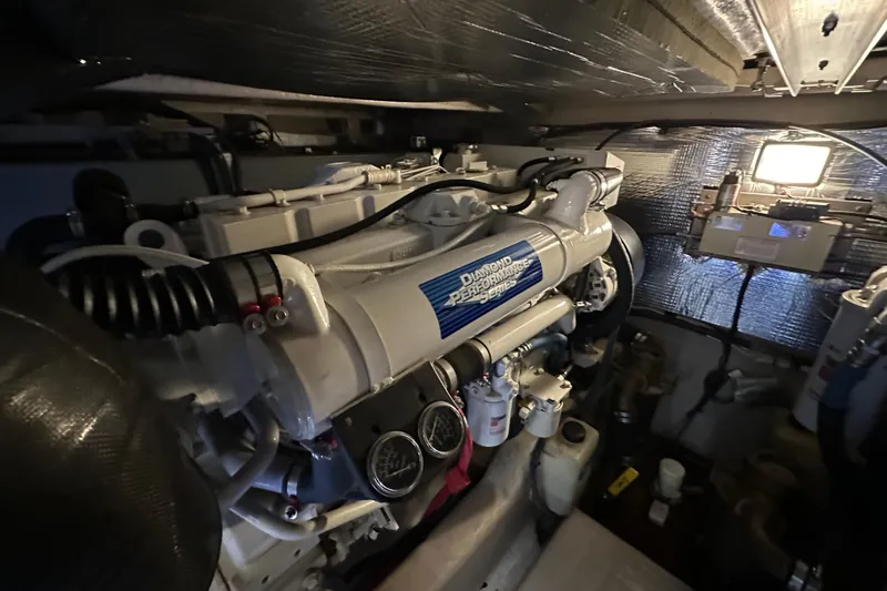 Slide: The Image of Engine room of 2004 Sea Ray 420 Sedan Bridge with Diamond Performance Series engine. - 34
