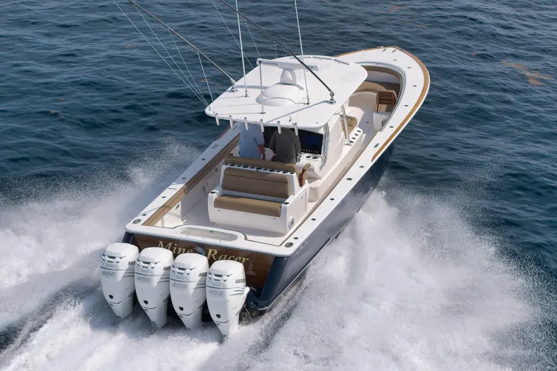 Slide: The Image of 2022 Valhalla Boatworks V-41 cruising on open water with four powerful engines. - 101