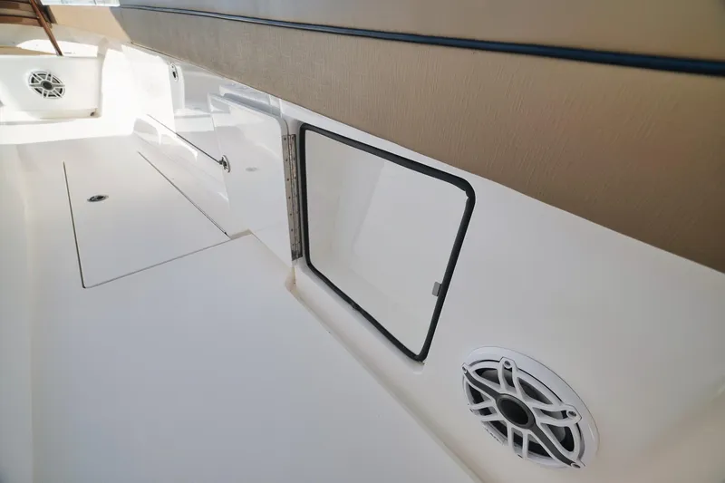 Slide: The Image of 2022 Valhalla Boatworks V-41 interior with speaker and storage compartment. - 29