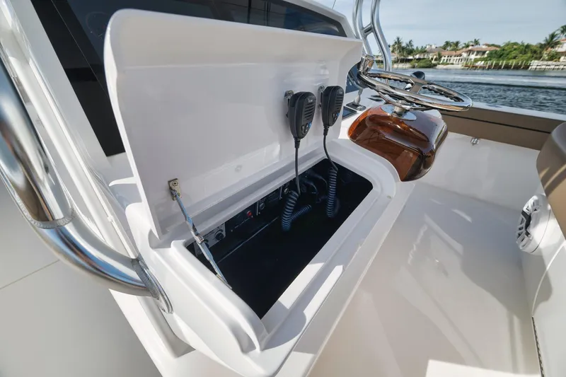 Slide: The Image of 2022 Valhalla Boatworks V-41 helm station with open console and communication equipment. - 38