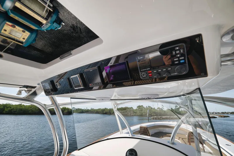 Slide: The Image of 2022 Valhalla Boatworks V-41 helm with advanced navigation and communication systems. - 40