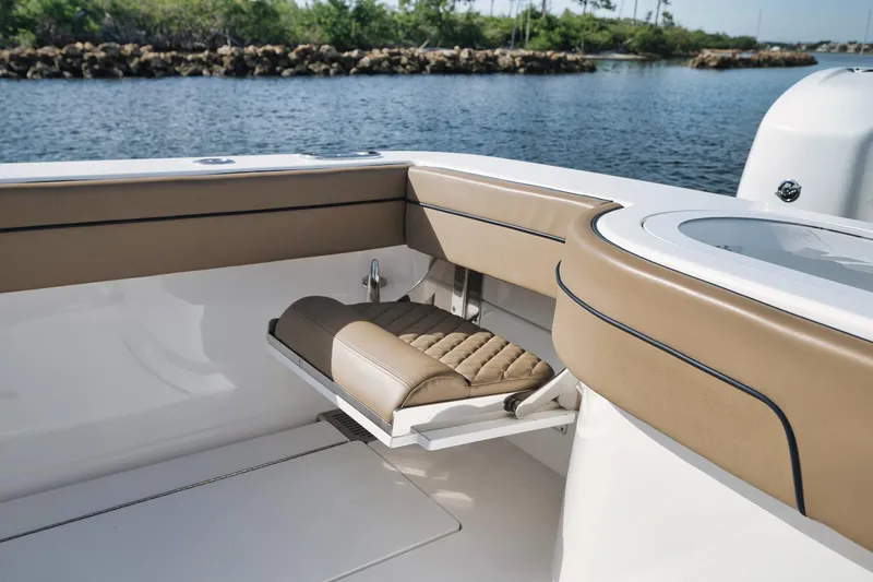 Slide: The Image of 2022 Valhalla Boatworks V-41 interior with tan seating and sleek design. - 53