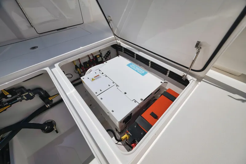Slide: The Image of 2022 Valhalla Boatworks V-41 engine compartment with electrical components and wiring. - 59