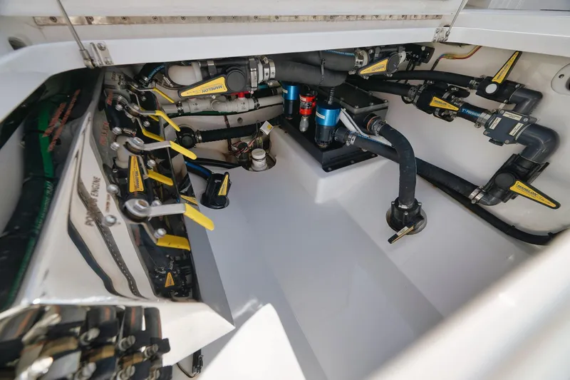 Slide: The Image of 2022 Valhalla Boatworks V-41 engine compartment with detailed plumbing and mechanical systems. - 62