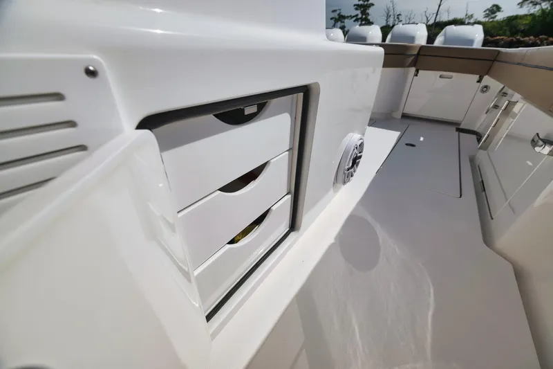 Slide: The Image of 2022 Valhalla Boatworks V-41 interior with storage drawers and seating area. - 67