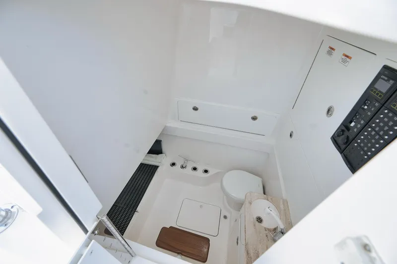 Slide: The Image of 2022 Valhalla Boatworks V-41 interior cabin with modern amenities and control panel. - 73