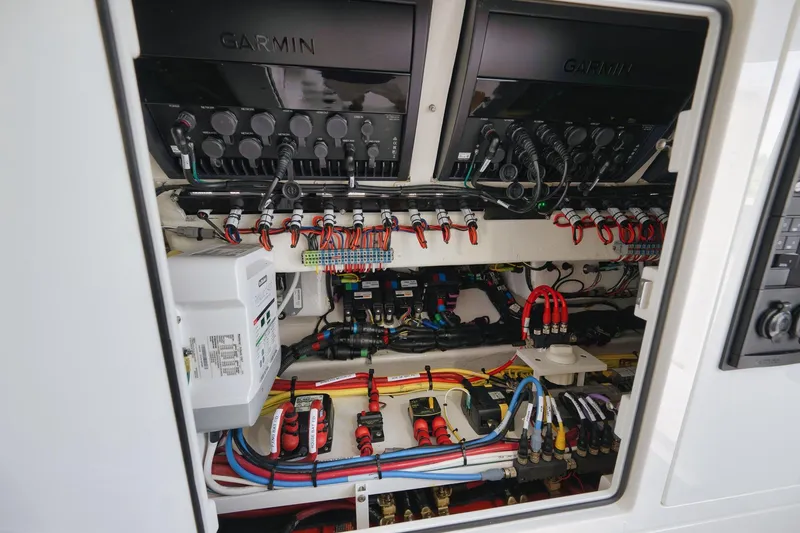 Slide: The Image of 2022 Valhalla V-41 boat electrical system with Garmin equipment and organized wiring. - 75