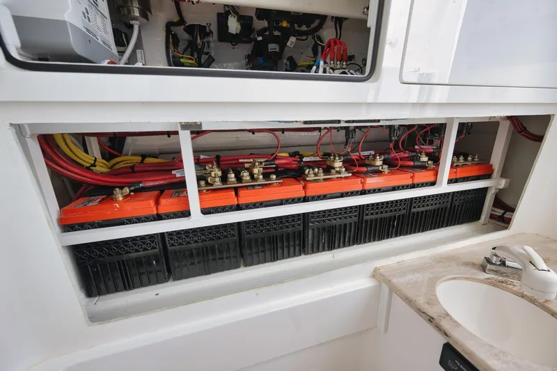 Slide: The Image of 2022 Valhalla Boatworks V-41 battery compartment with wiring and connections. - 77