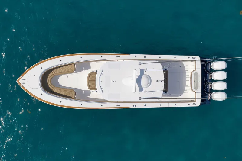 Slide: The Image of Overhead view of 2022 Valhalla Boatworks V-41 on clear blue water. - 86