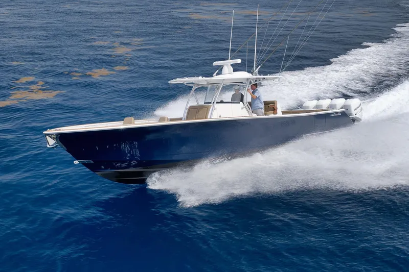 Slide: The Image of 2022 Valhalla Boatworks V-41 cruising on open water, showcasing sleek design and powerful performance. - 99