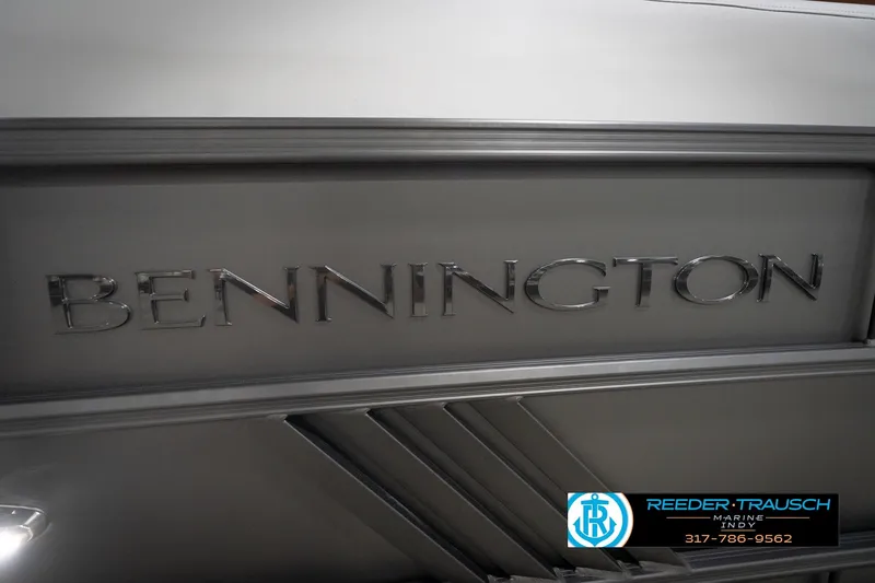 Slide: The Image of 2026 Bennington 24 MFB boat logo with Reeder Trausch Marine contact details. - 103