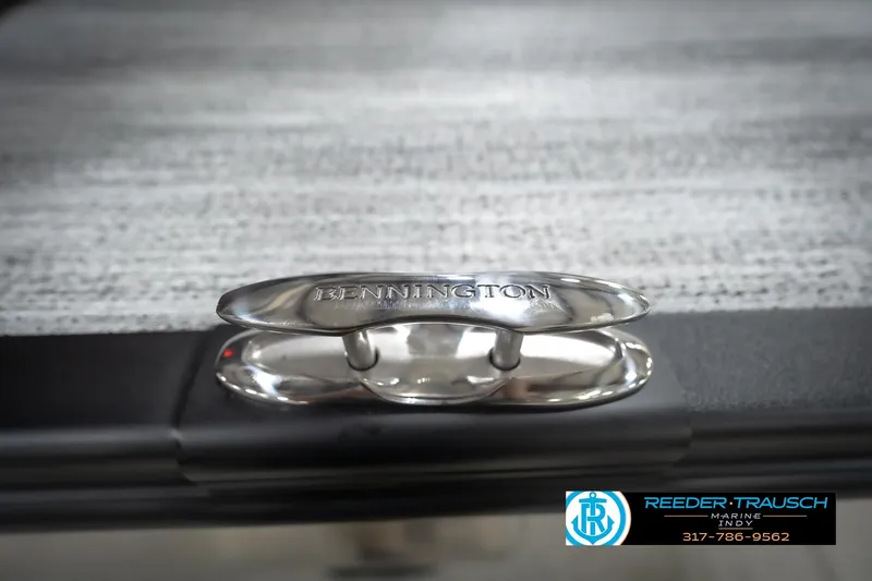 Slide: The Image of 2026 Bennington 24 MFB boat cleat with Reeder-Trausch Marine logo. - 107