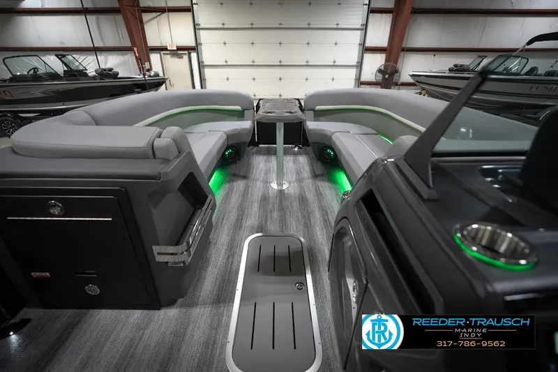 Slide: The Image of 2026 Bennington 24 MFB boat delivery service advertisement with scenic water backdrop. - 19