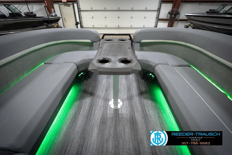 Slide: The Image of 2026 Bennington 24 MFB boat interior with luxurious gray seating and modern design. - 20