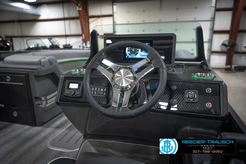 Slide: The Image of Luxurious interior of 2026 Bennington 24 MFB pontoon boat with stylish seating and ambient lighting. - 30