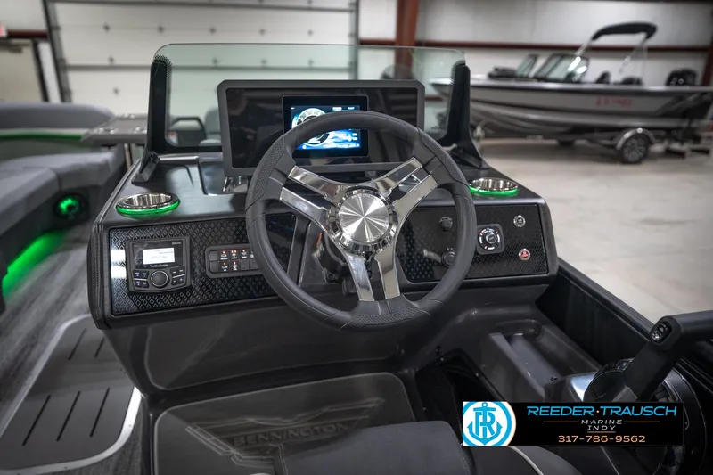 Slide: The Image of Temperature-controlled showroom with Bennington 24 MFB boats, offering premium, weather-proof shopping experience. - 31