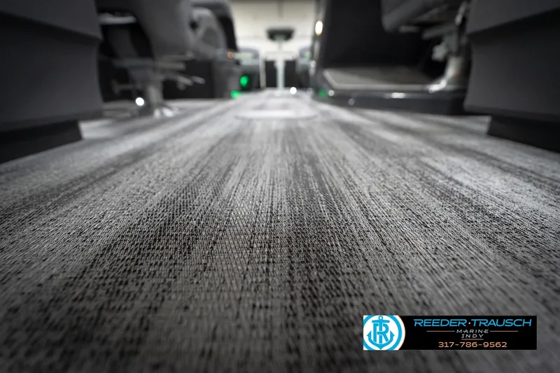 Slide: The Image of Close-up of 2026 Bennington 24 MFB dashboard with horn and power buttons. - 44