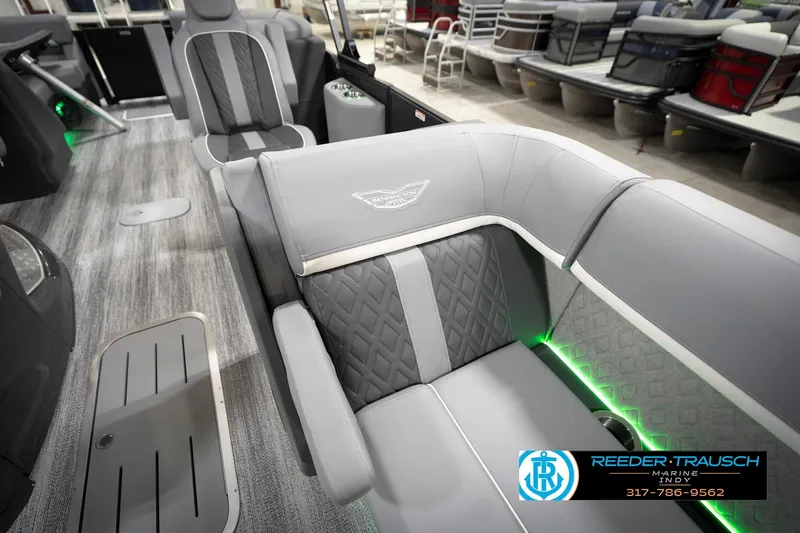 Slide: The Image of Luxurious interior of 2026 Bennington 24 MFB pontoon boat with stylish seating and ambient lighting. - 78