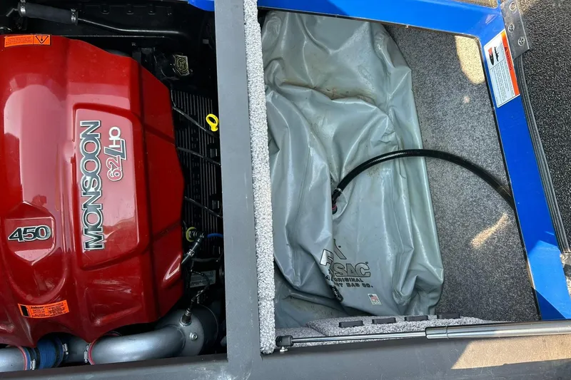 Slide: The Image of 2017 Malibu Wakesetter 25 LSV engine compartment with Monsoon 6.2L engine and ballast bag. - 53