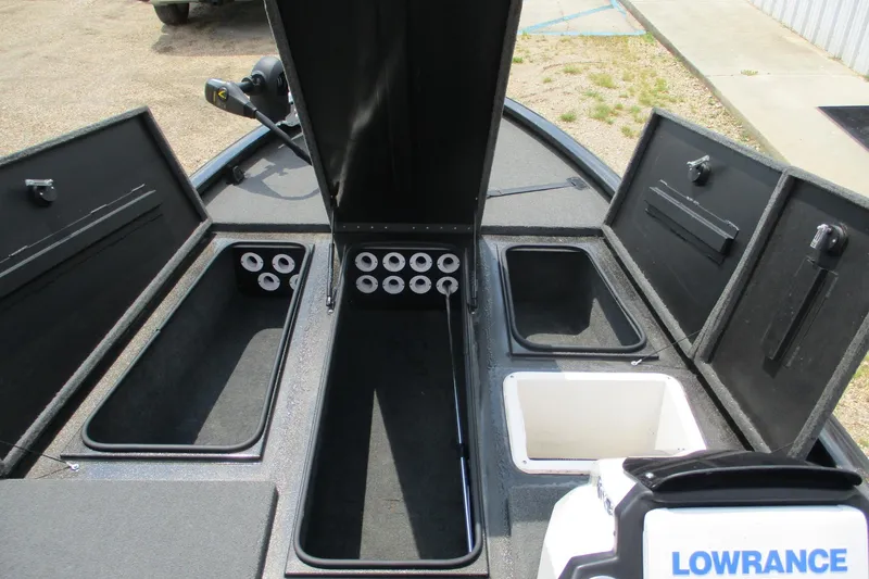 Slide: The Image of 2021 Avid 20XB boat interior with storage compartments and Lowrance equipment. - 11