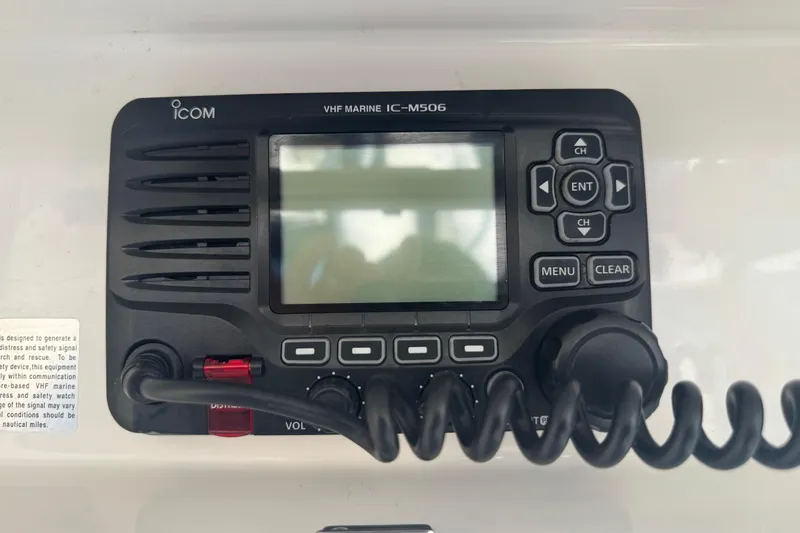 Slide: The Image of VHF marine radio Icom IC-M506 on a 2017 Regulator 28 boat dashboard. - 37