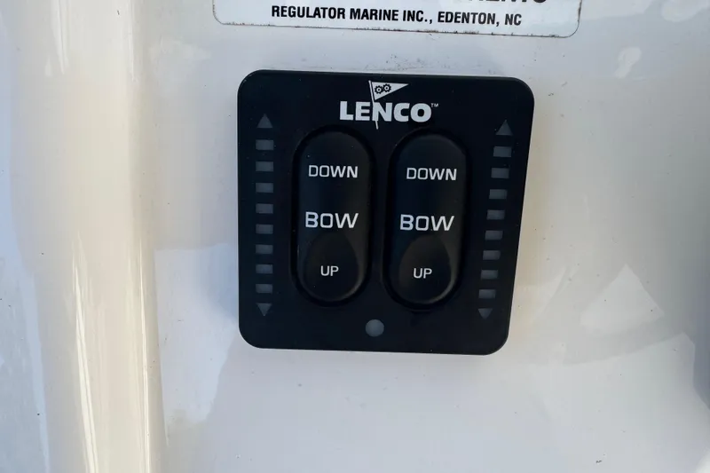 Slide: The Image of Lenco trim tab control panel on 2017 Regulator 28 boat. - 42