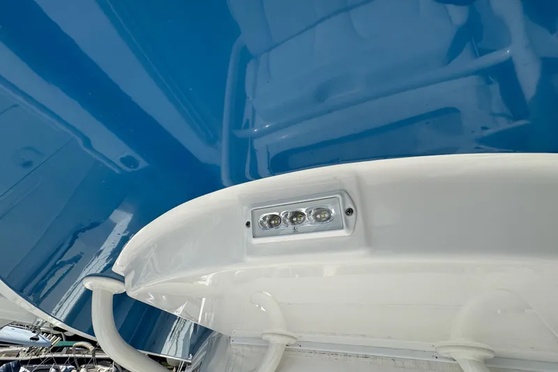 Slide: The Image of 2017 Regulator 28 boat with blue interior and mounted LED light. - 46