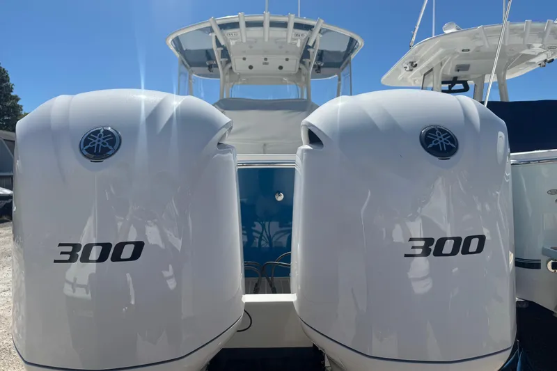 Slide: The Image of 2017 Regulator 28 boat with twin 300 horsepower outboard engines. - 6