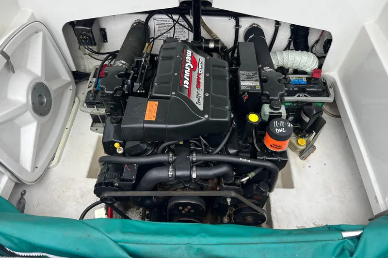 Slide: The Image of Engine compartment of a 1998 Formula 252 SS boat with MerCruiser engine. - 31