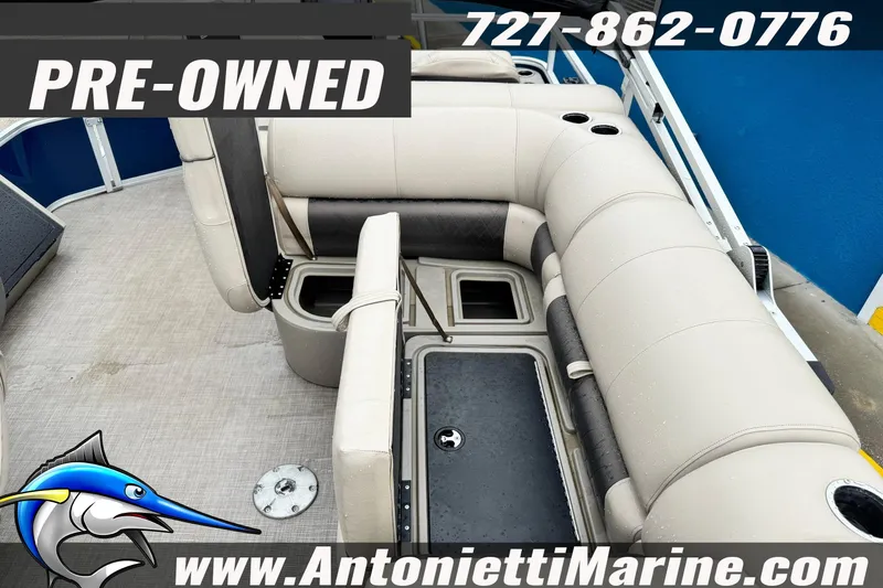 Slide: The Image of Pre-owned 2022 Sun Tracker 22 Sport Fish DLX pontoon boat interior with seating. - 10