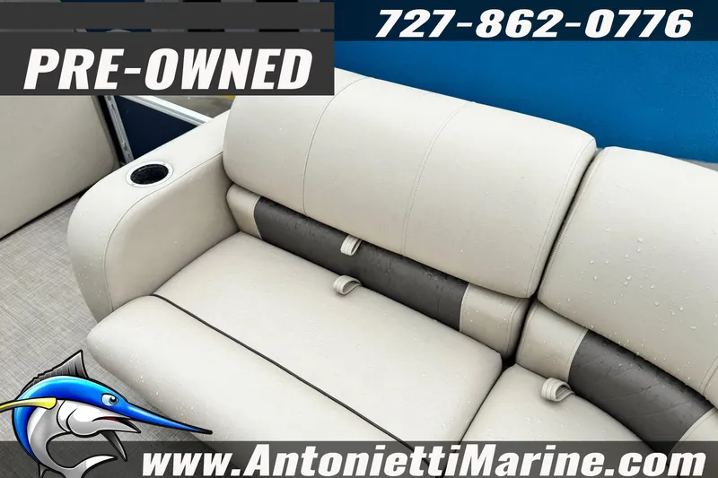 Slide: The Image of Pre-owned 2022 Sun Tracker 22 Sport Fish DLX boat seating with cup holder, Antonietti Marine. - 16