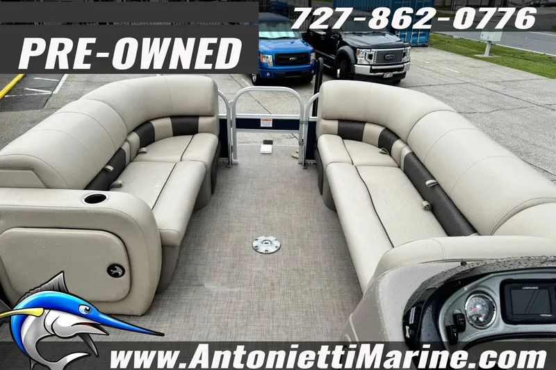 Slide: The Image of Pre-owned 2022 Sun Tracker 22 Sport Fish DLX pontoon boat with spacious seating, available at Antonietti Marine. - 19