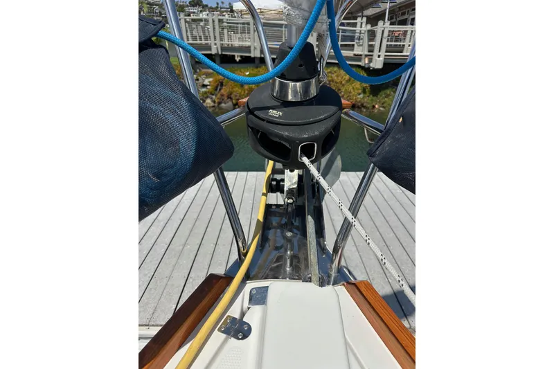 Slide: The Image of Bow of 2018 Elan 45 Impressions yacht docked, featuring ropes and deck details. - 17