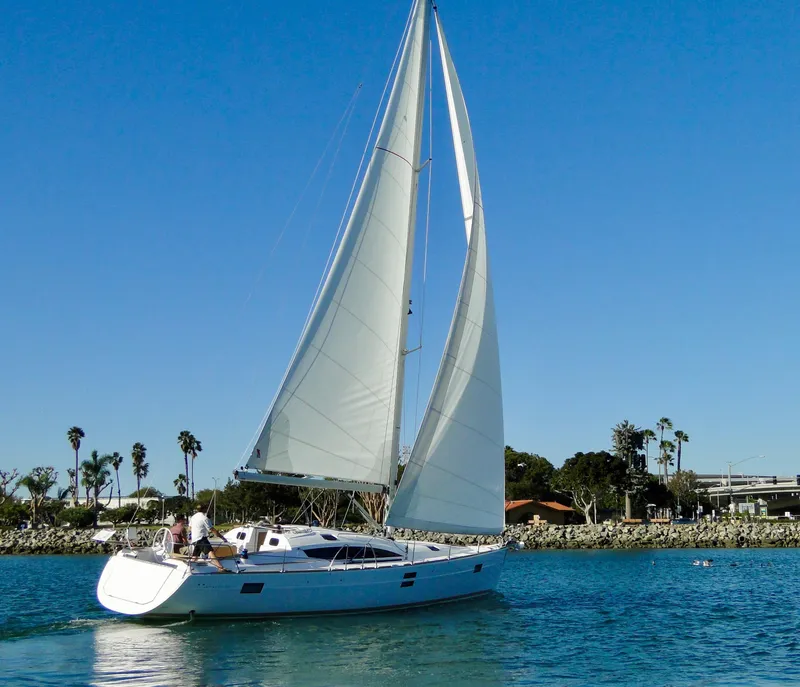 Slide: The Image of 2018 Elan 45 Impressions sailboat cruising on a sunny day with clear blue skies. - 3