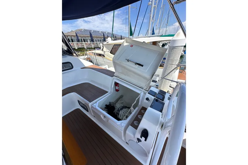 Slide: The Image of Open storage compartment on 2018 Elan 45 Impressions yacht, docked at marina. - 36