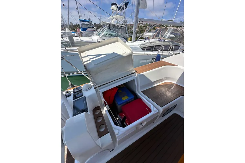 Slide: The Image of Open storage compartment on 2018 Elan 45 Impressions yacht, docked at marina. - 37