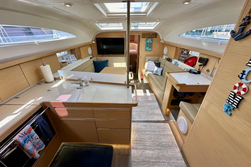 Slide: The Image of Interior of 2018 Elan 45 Impressions yacht with modern kitchen and cozy seating area. - 40
