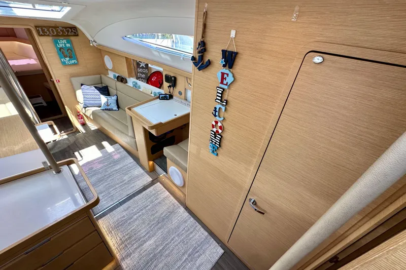 Slide: The Image of Interior of 2018 Elan 45 Impressions yacht with cozy seating and nautical decor. - 42